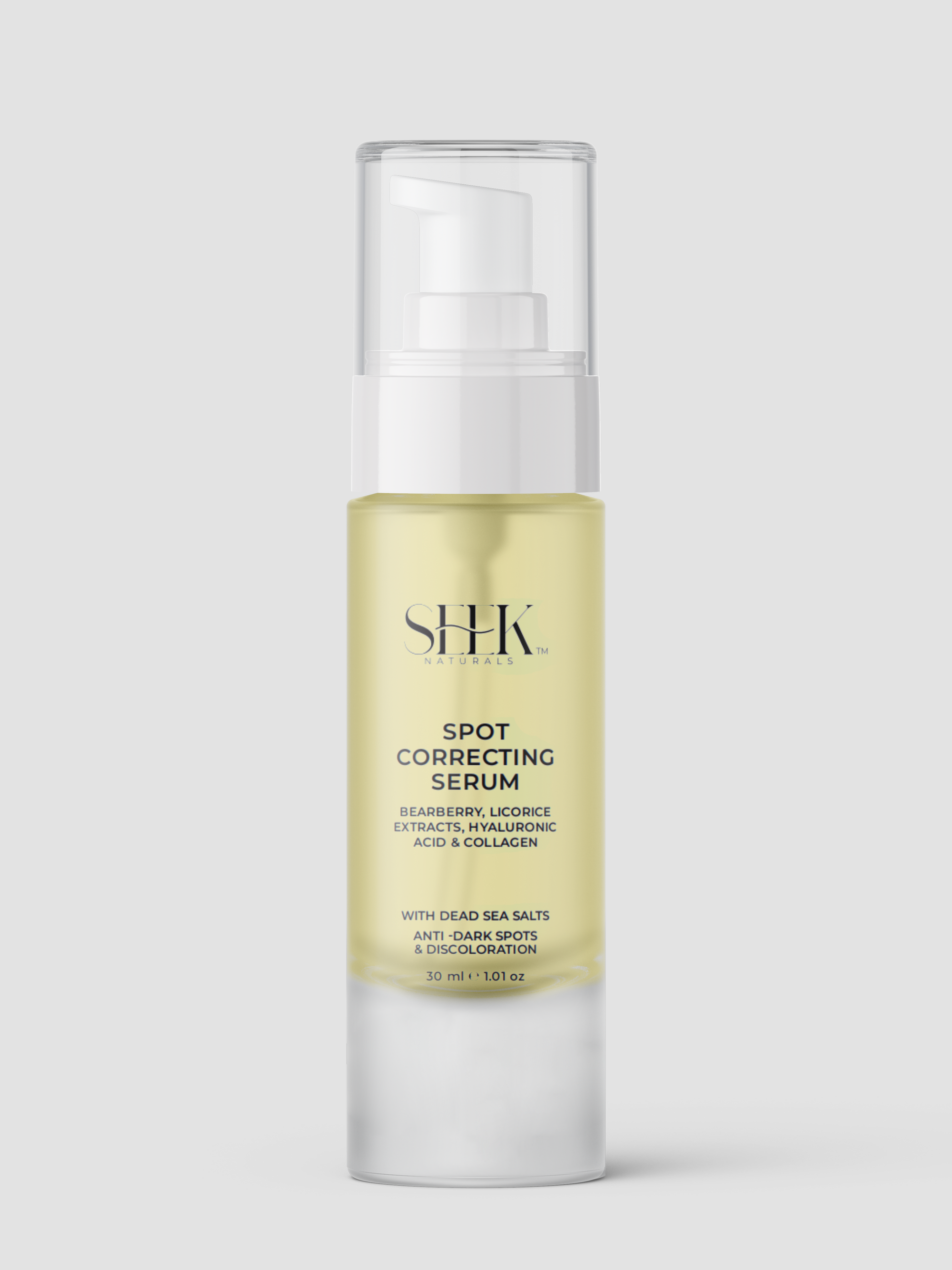 Vitamin C and licorice extract ingredients beside serum bottle